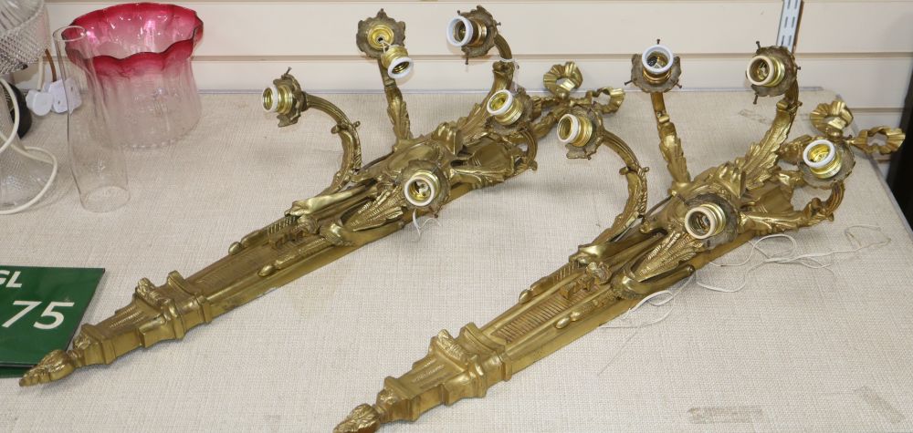 A pair of gilt metal five branch wall lights, length 98cm